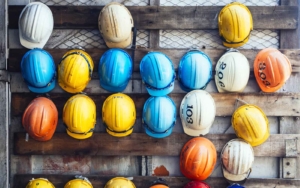 safety hats on wood wall